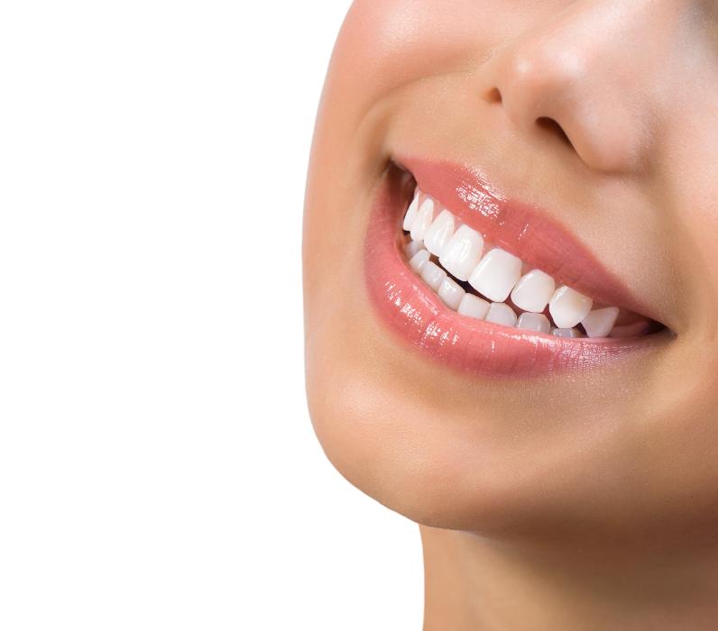 A smiling female patient after preventive dentistry in Randolph, NJ