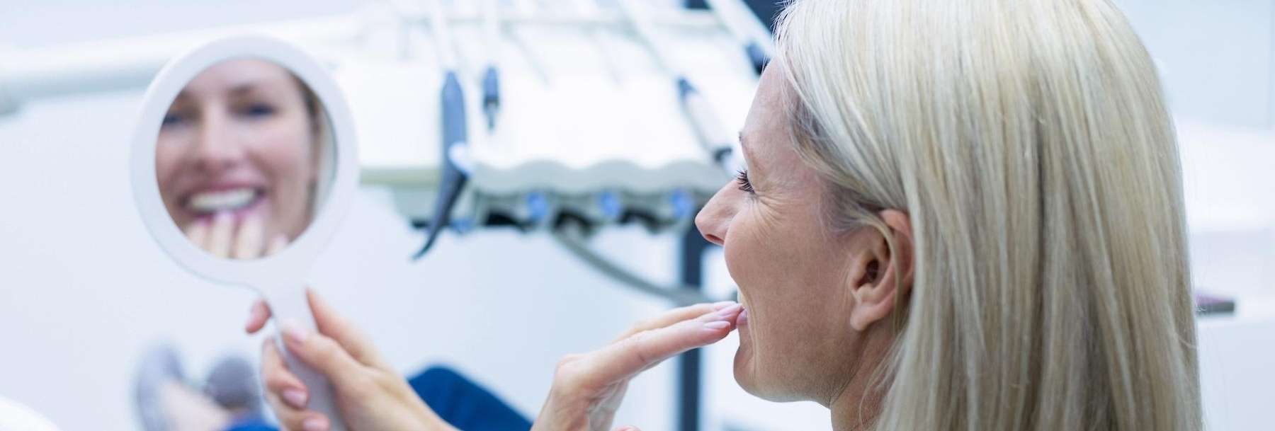 A patient smiling after getting dental cosmetics in Randolph, NJ