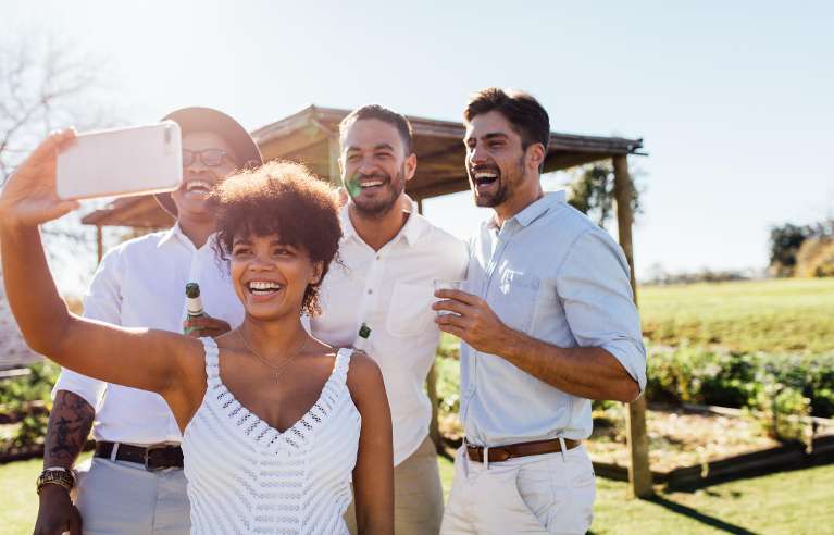 A group of friends smiling after getting Dental Implants in Randolph, NJ