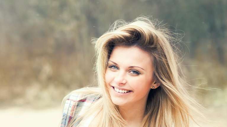 A woman after a Cosmetic Dentistry in Randolph, NJ