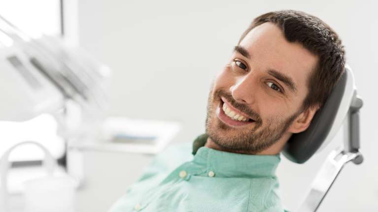 Patient readying himself for teeth cleaning in Randolph, NJ