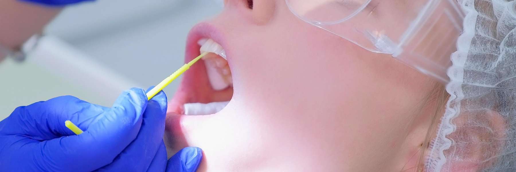 Lady undergoing teeth cleaning in Randolph, NJ