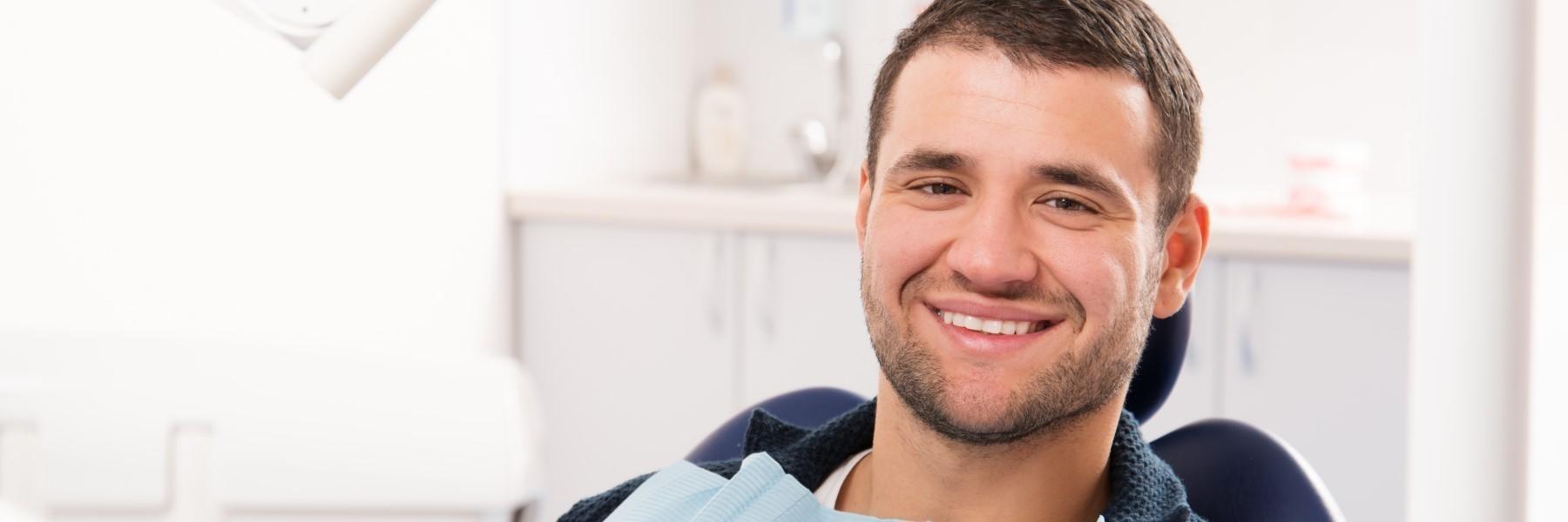 man smiling in dental chair in randolph